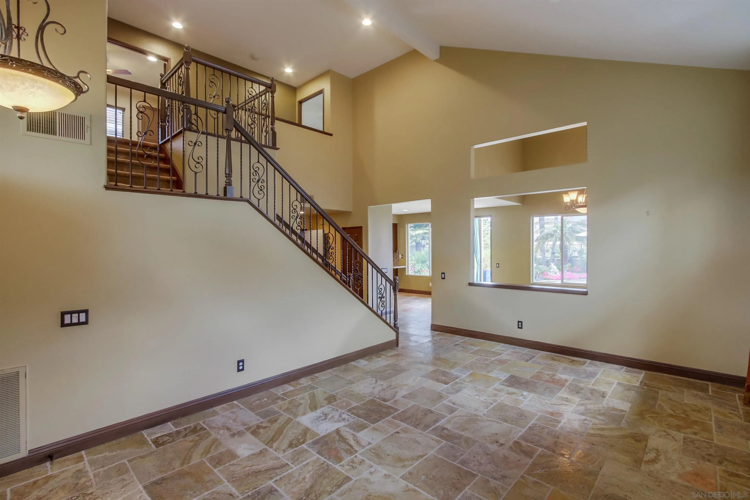 6550 Windward Ridge Way San Diego, CA 92121 - Photo 18 of 64 a view of an entryway with stairs