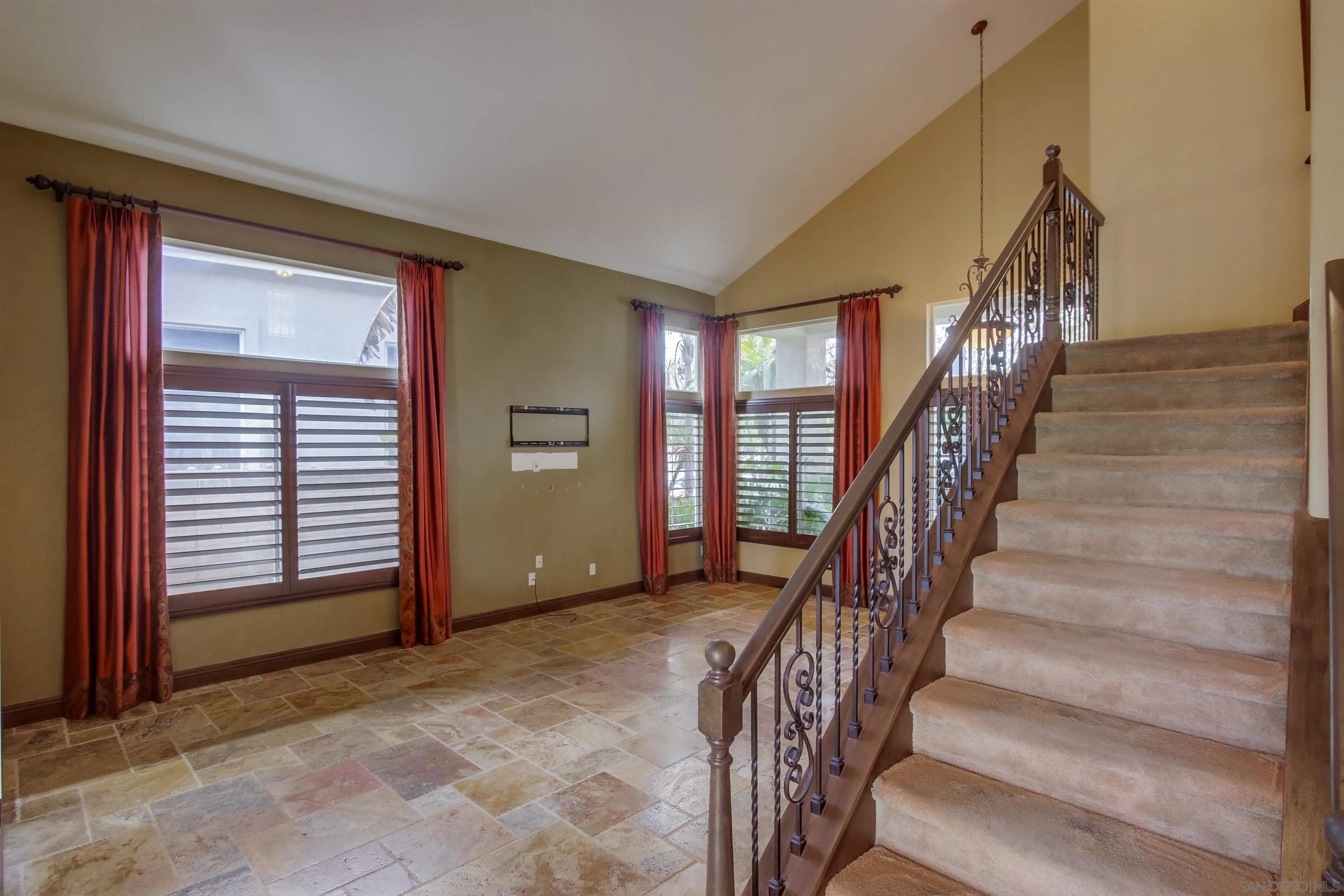 6550 Windward Ridge Way San Diego, CA 92121 - Photo 20 of 64 a view of an entryway with staircase
