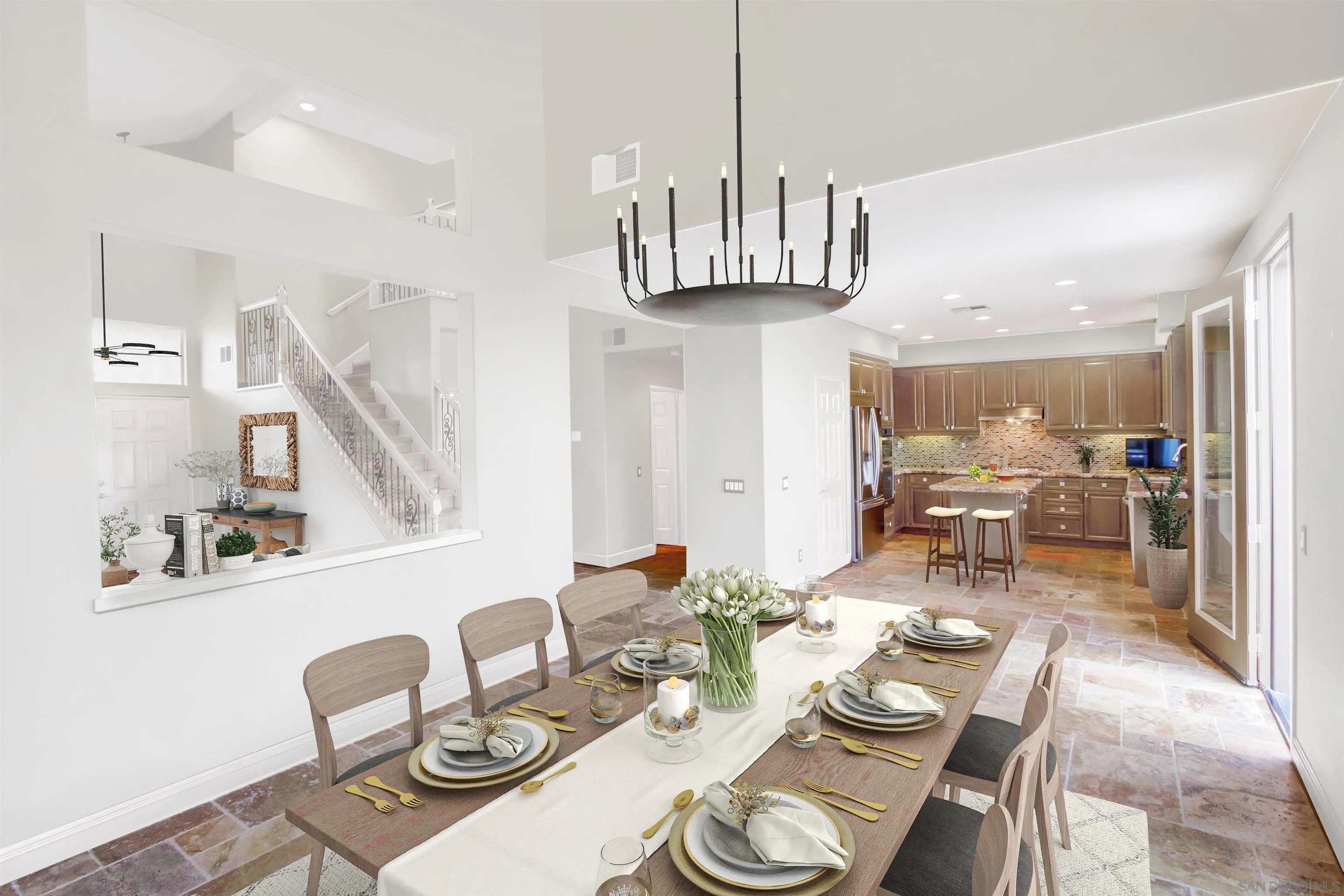 6550 Windward Ridge Way San Diego, CA 92121 - Photo 3 of 64 a view of a dining room with furniture a kitchen and chandelier