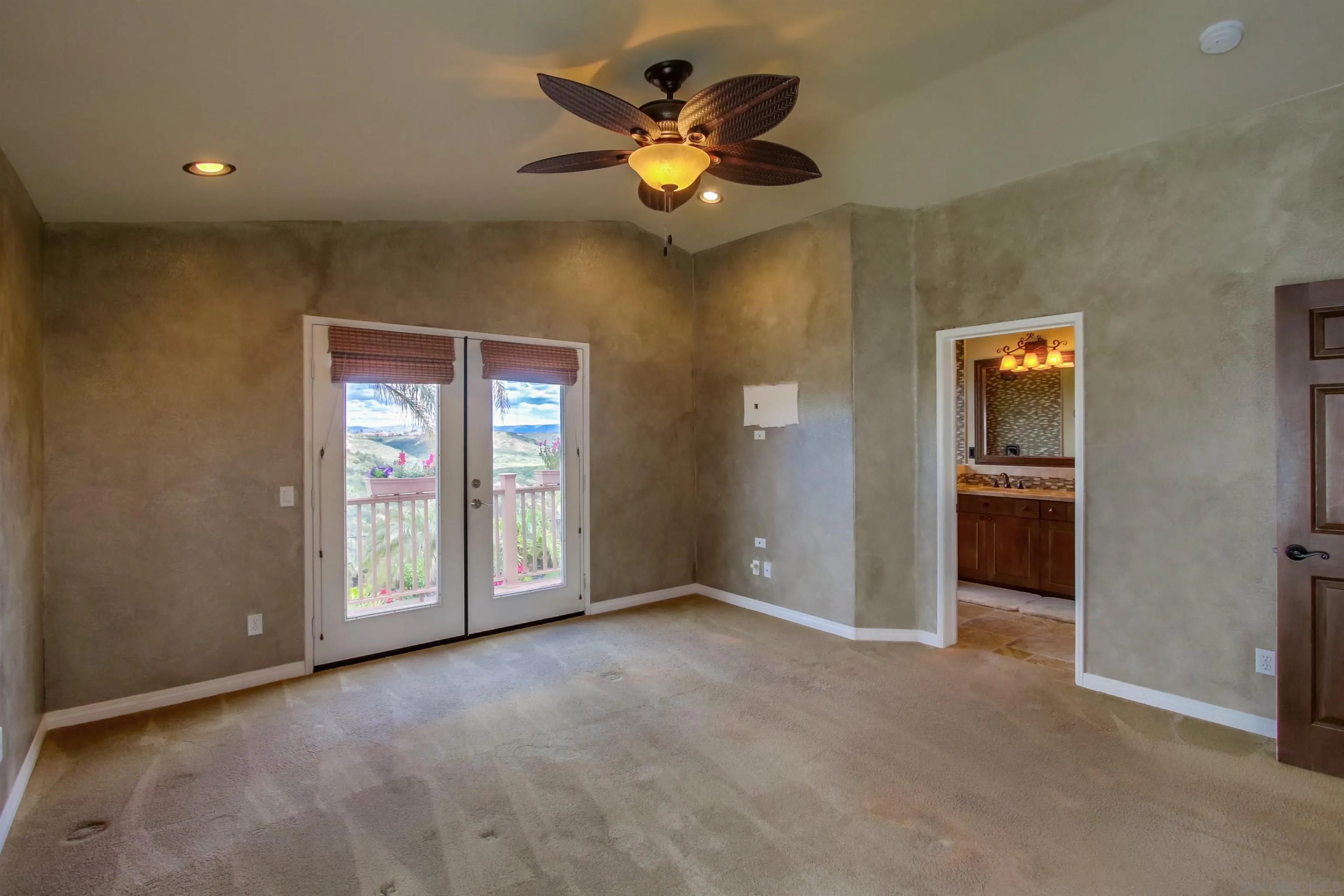 6550 Windward Ridge Way San Diego, CA 92121 - Photo 33 of 64 a view of an empty room with a window