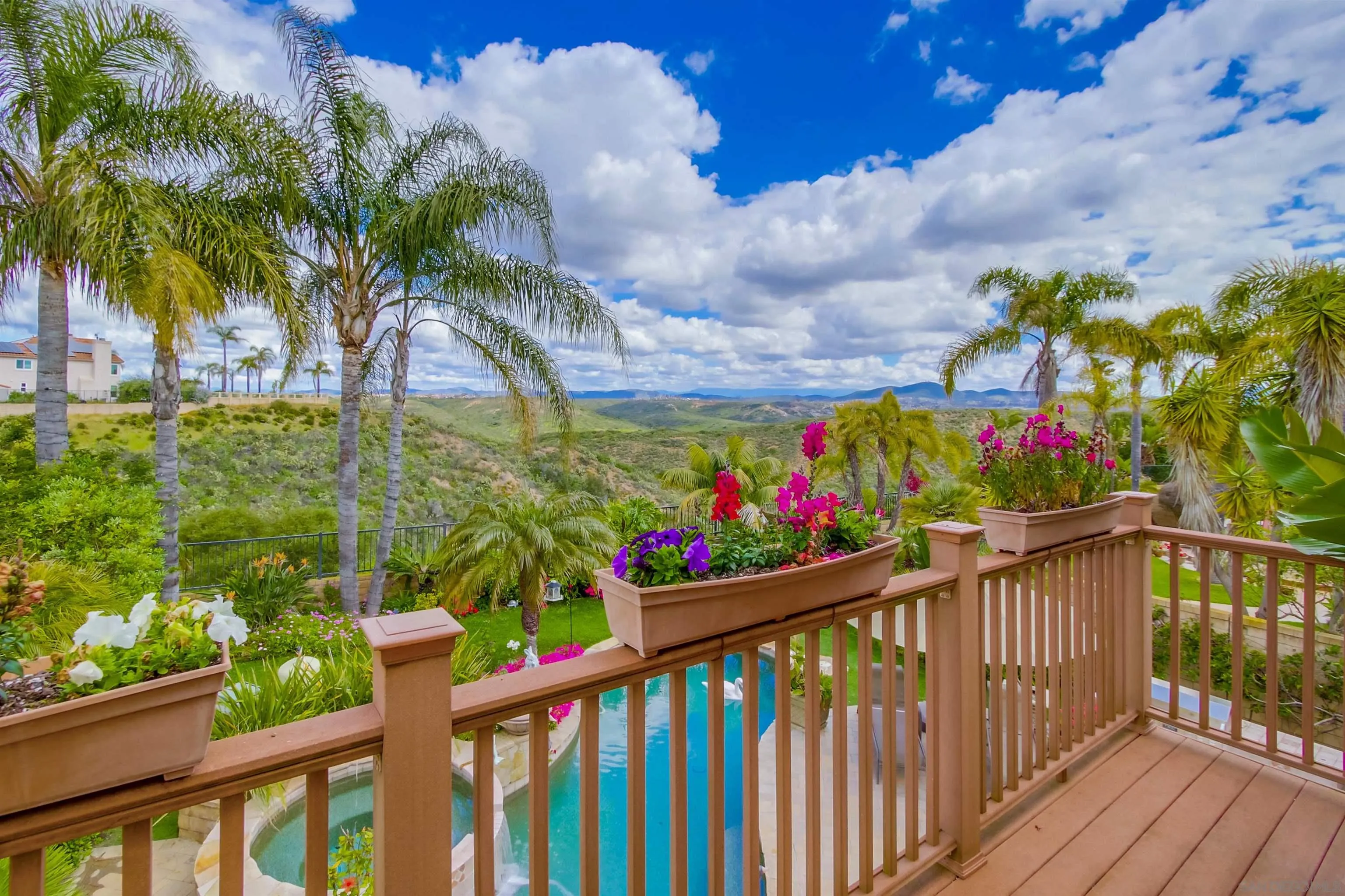 6550 Windward Ridge Way San Diego, CA 92121 - Photo 39 of 64 a view of a balcony with wooden fence