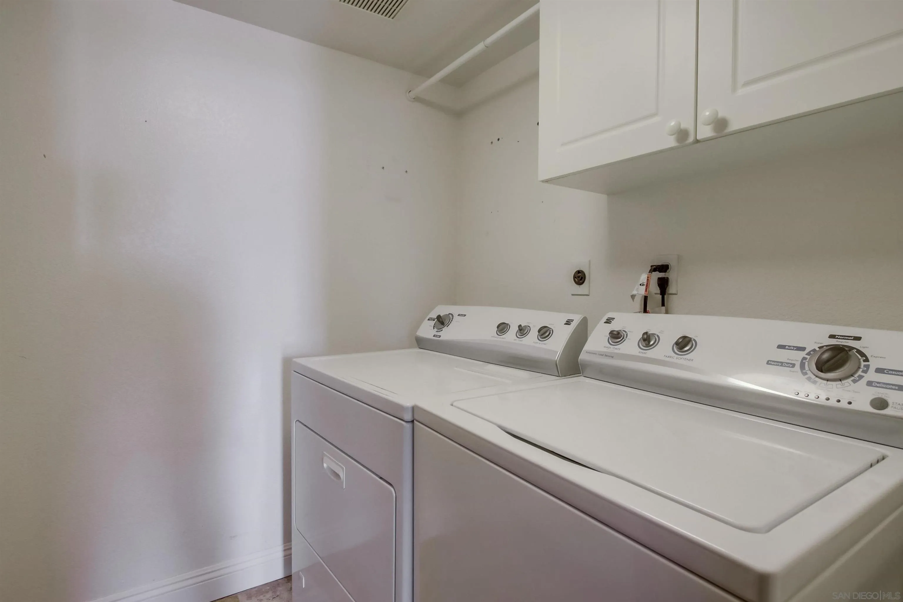 6550 Windward Ridge Way San Diego, CA 92121 - Photo 54 of 64 a utility room with dryer and washer