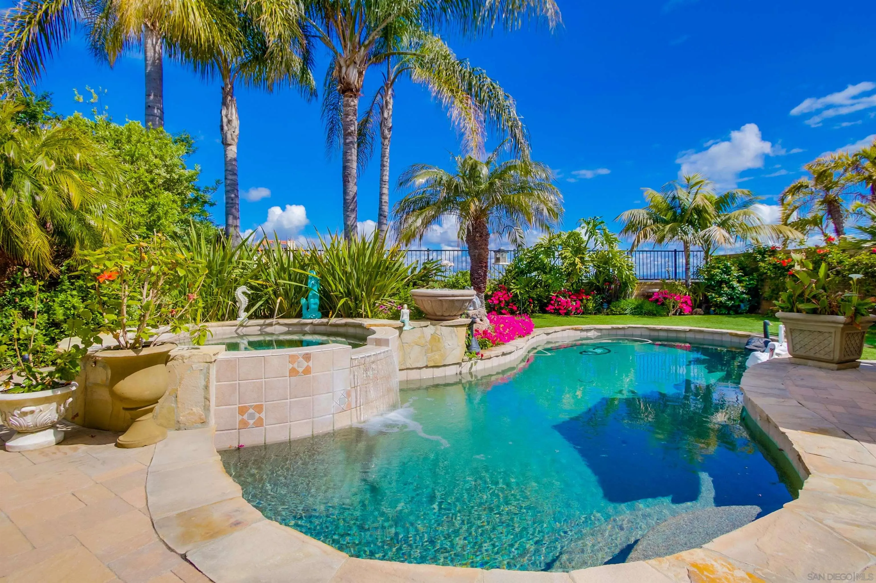 6550 Windward Ridge Way San Diego, CA 92121 - Photo 58 of 64 a view of a swimming pool with a patio