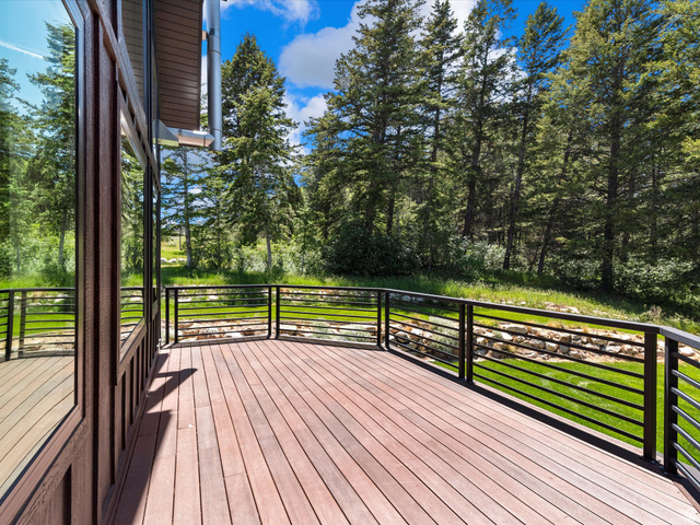 1225 Old Oregon Road Soda Springs, ID 83276 - Photo 45 of 67 Expansive outdoor deck featuring wood-finish flooring and a black metal horizontal bar railing system