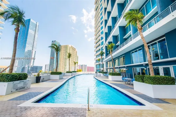 a view of an buildings with swimming pool