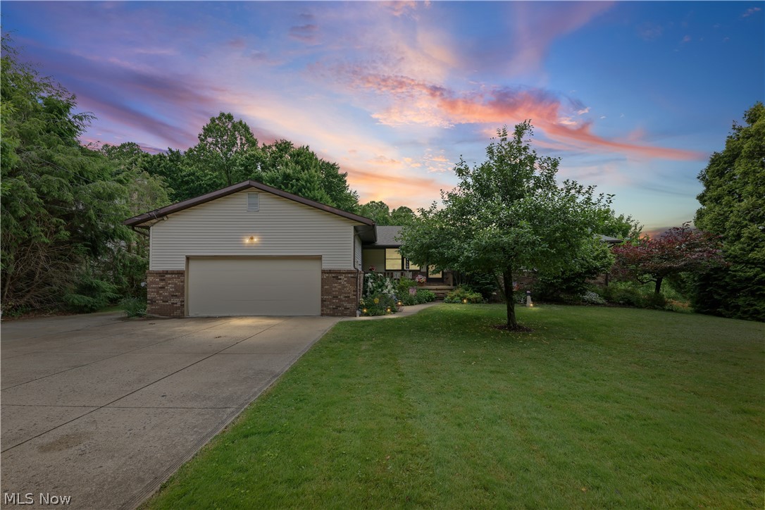 1835 Lynn Road Kent, OH 44240 - Photo 1 of 48 Residence featuring a two-car garage, concrete driveway, and brick accent siding