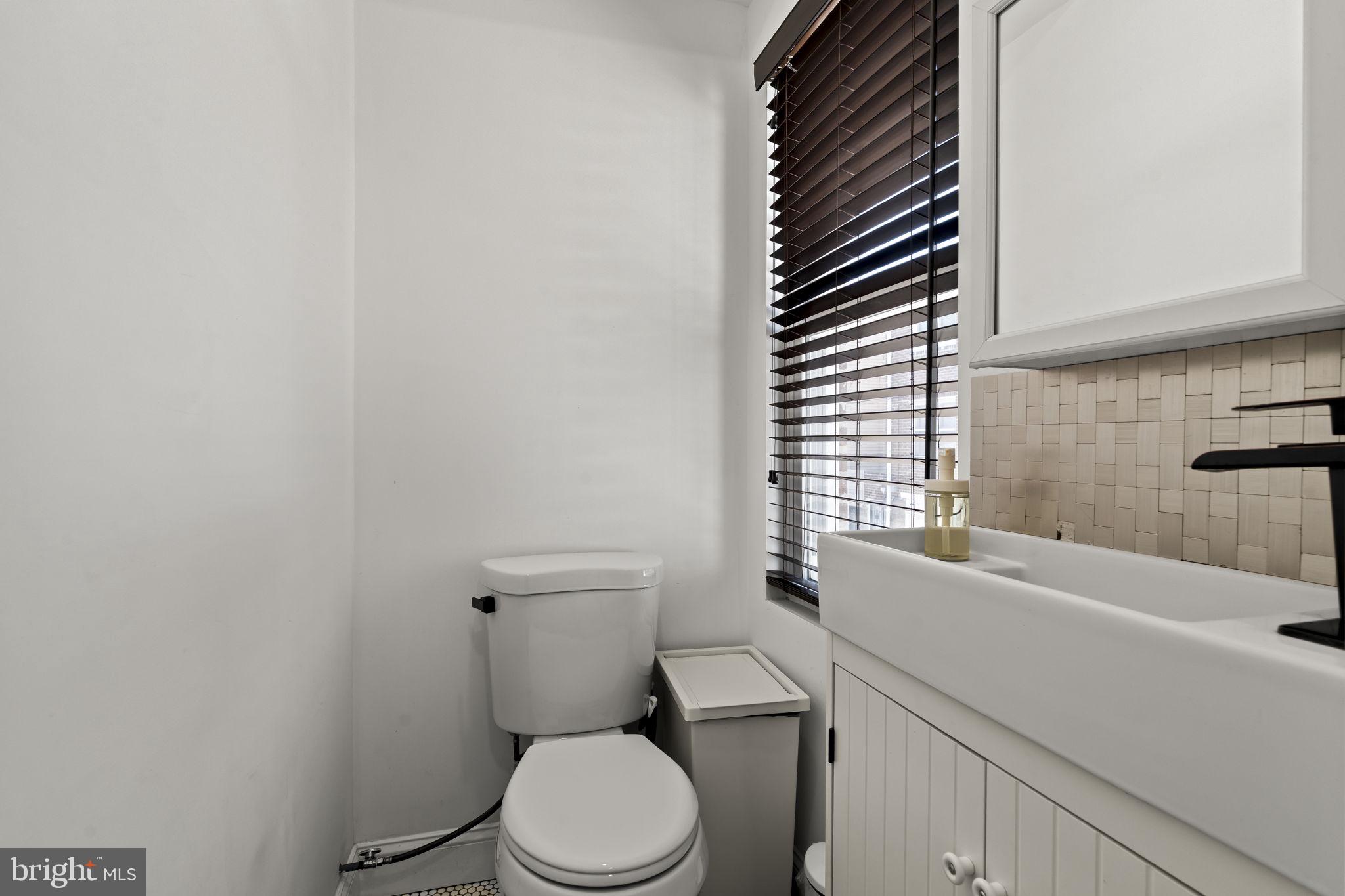 2118 North Wanamaker Street Philadelphia, PA 19131 - Photo 13 of 33 Half bath next to laundry