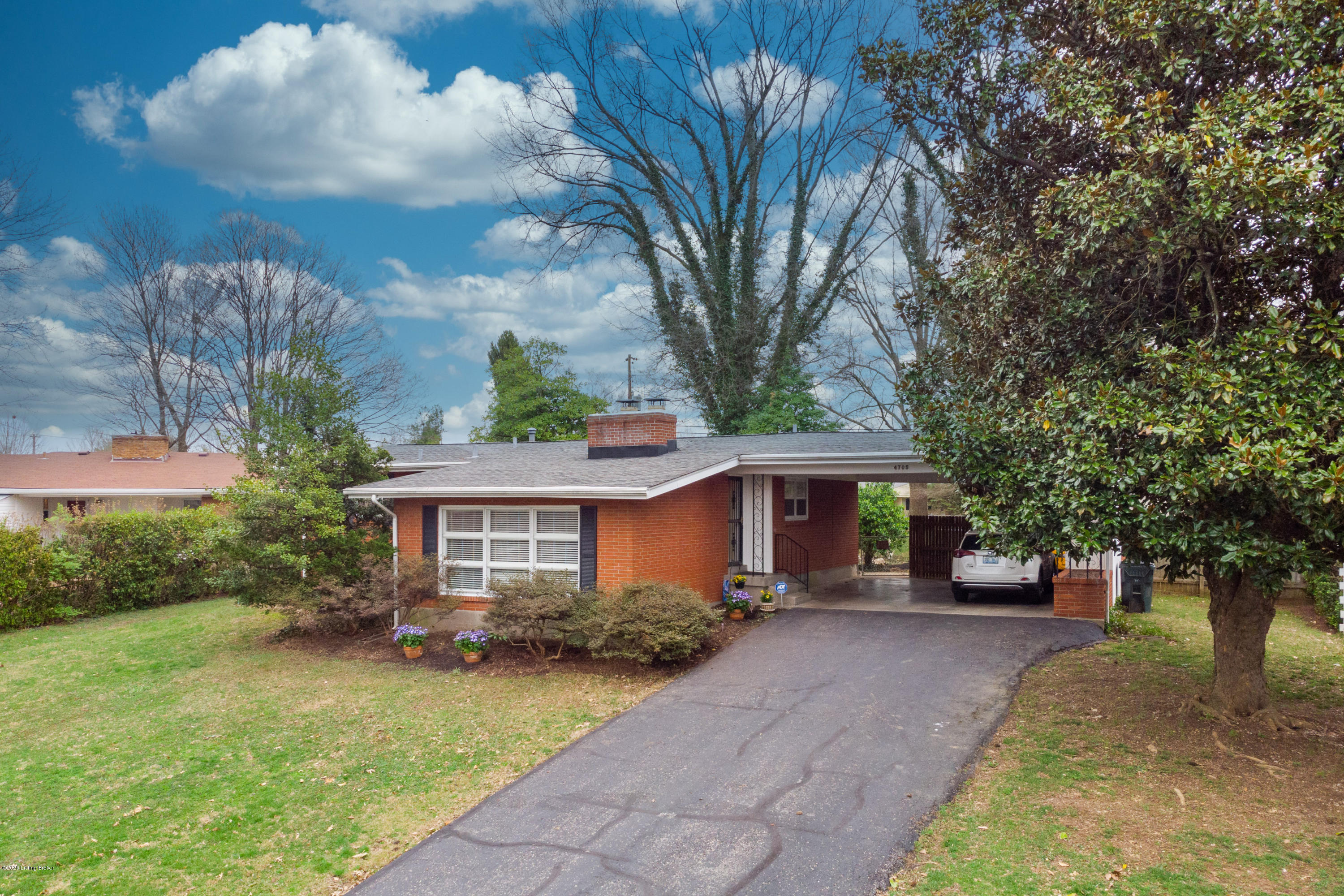 Located on nearly ½ an acre, this all brick home offers 3 bedrooms, 2 full baths, and a finished basement