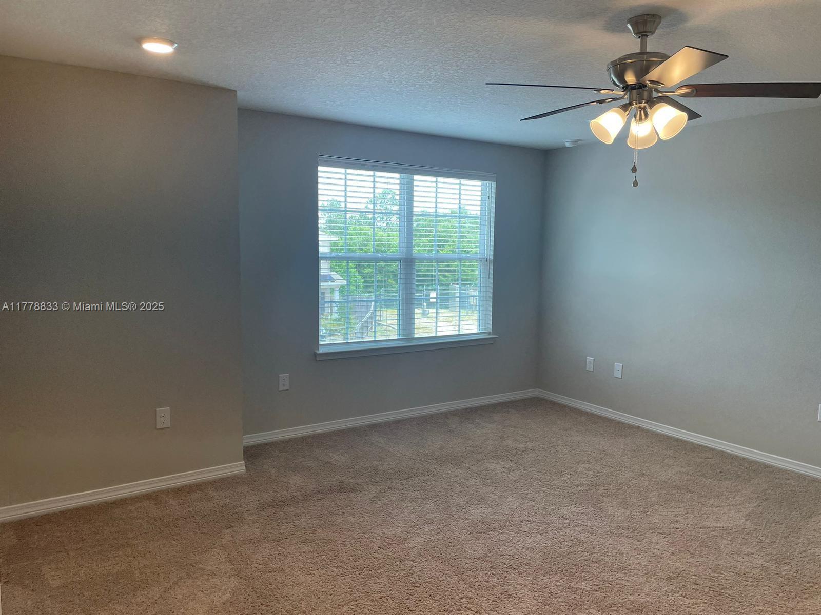 219 Wainwright Drive Crestview, FL 32539 - Photo 12 of 31 an empty room with a window