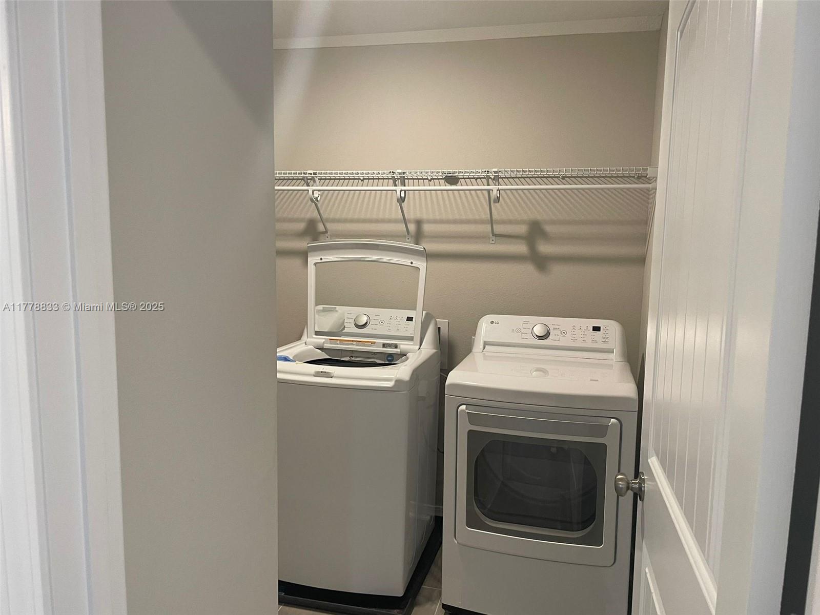 219 Wainwright Drive Crestview, FL 32539 - Photo 18 of 31 a utility room with dryer and washer