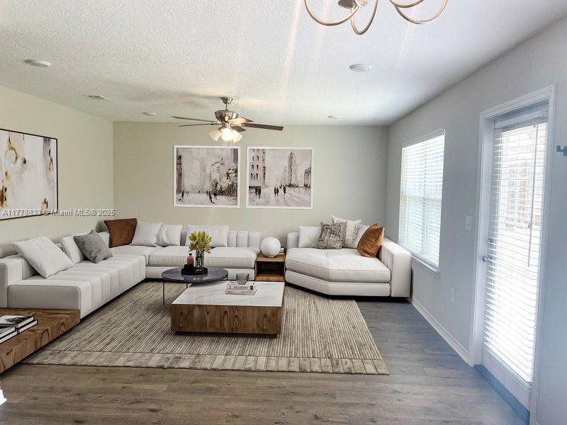 219 Wainwright Drive Crestview, FL 32539 - Photo 2 of 31 a living room with furniture and a large window