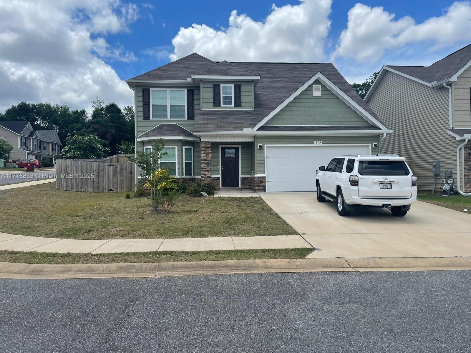 219 Wainwright Drive Crestview, FL 32539 - Photo 25 of 31 a car parked in front of a house