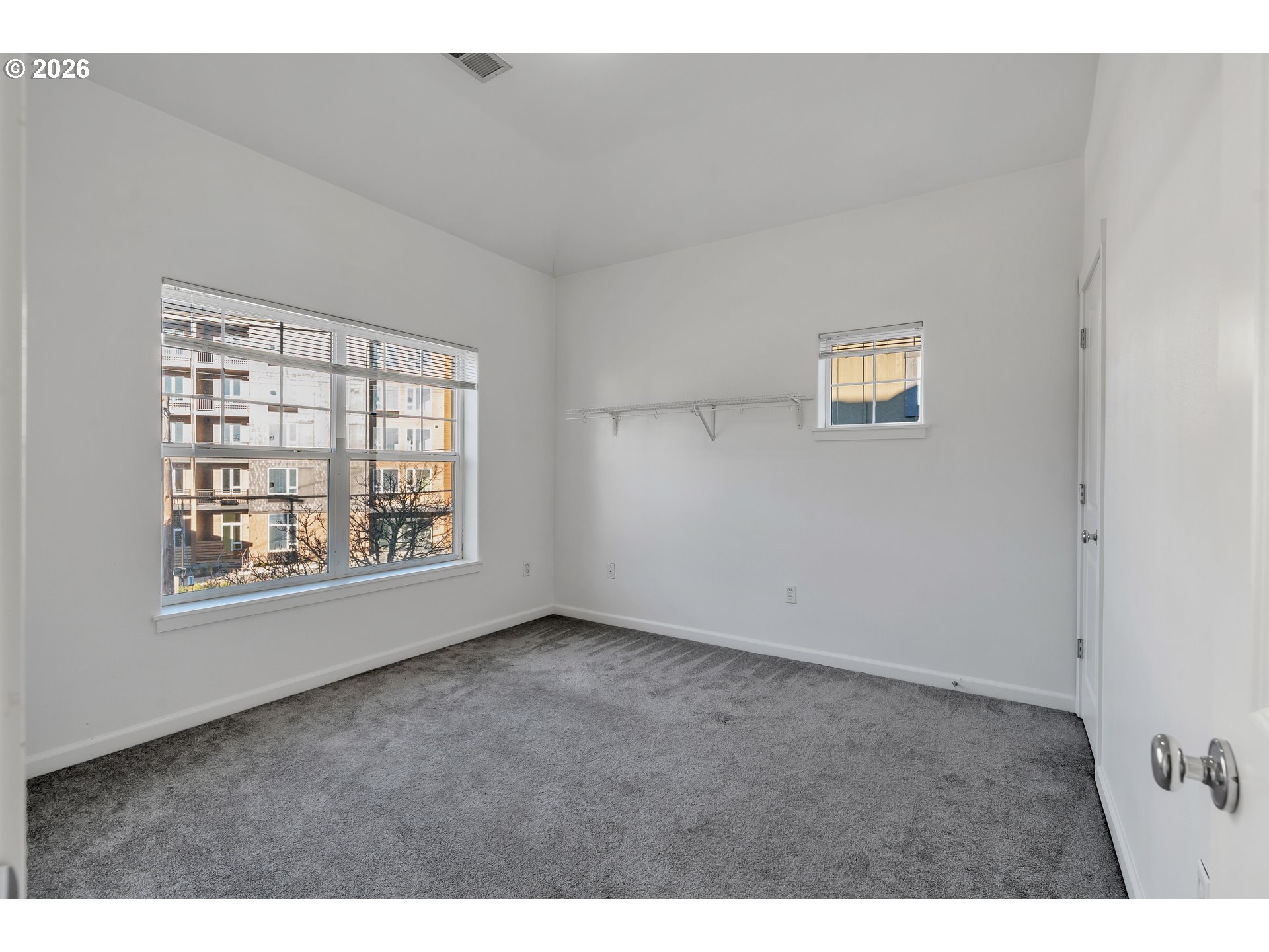 1000 Southwest 170th Avenue, Unit 201 Beaverton, OR 97003 - Photo 20 of 37 a view of an empty room with a window