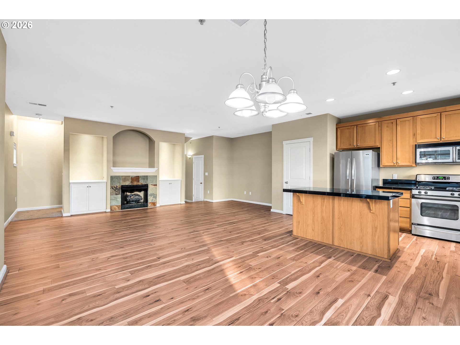 1000 Southwest 170th Avenue, Unit 201 Beaverton, OR 97003 - Photo 7 of 37 a view of kitchen and sink with wooden floor