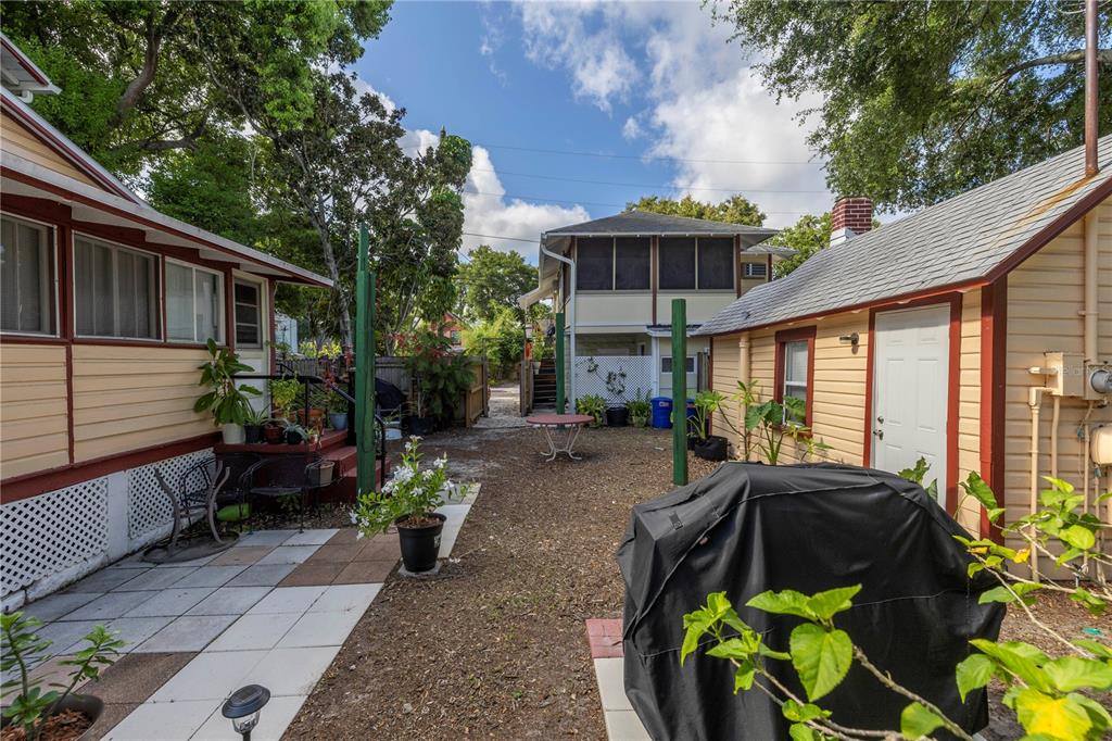 548 3rd Street North St. Petersburg, FL 33701 - Photo 11 of 28 a view of a house with sitting area and garden
