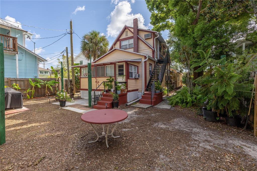 548 3rd Street North St. Petersburg, FL 33701 - Photo 13 of 28 a view of a chairs and tables in the patio