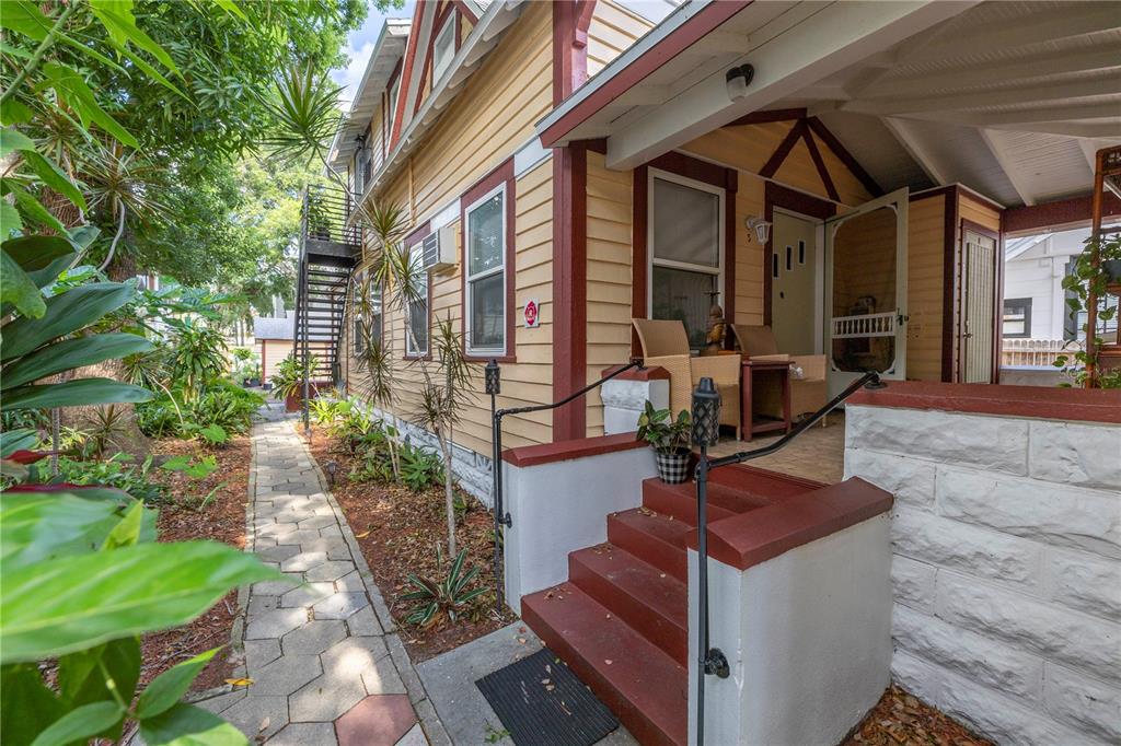 548 3rd Street North St. Petersburg, FL 33701 - Photo 6 of 28 a view of a chairs and table in the patio