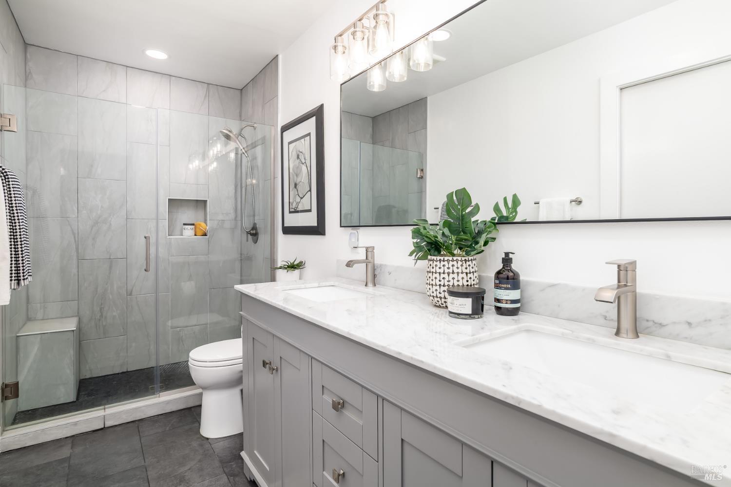 4 California Condor Way Novato, CA 94949 - Photo 12 of 20 a bathroom with a double vanity sink toilet and shower