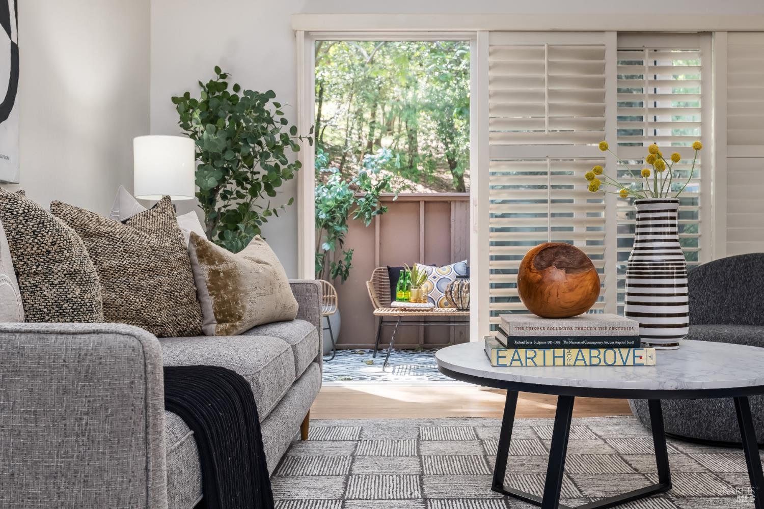 4 California Condor Way Novato, CA 94949 - Photo 3 of 20 a living room with furniture and a floor to ceiling window