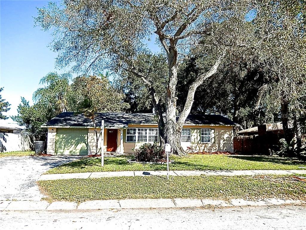 1870 Harding Street Clearwater, FL 33765 - Photo 1 of 1 a front view of a house with a yard