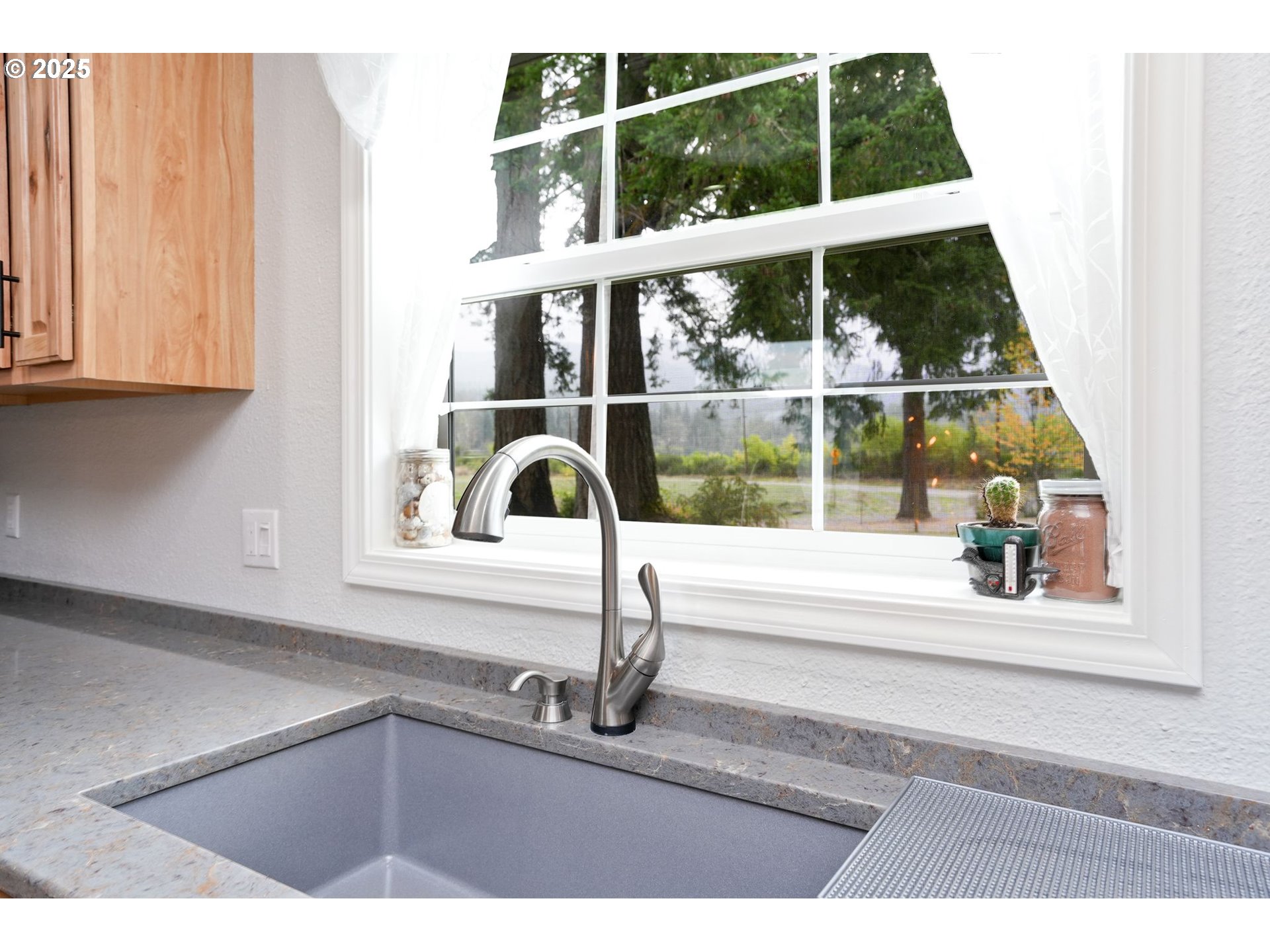 40219 North Dogwood Road Mill City, OR 97360 - Photo 14 of 47 a picture of a bench and window