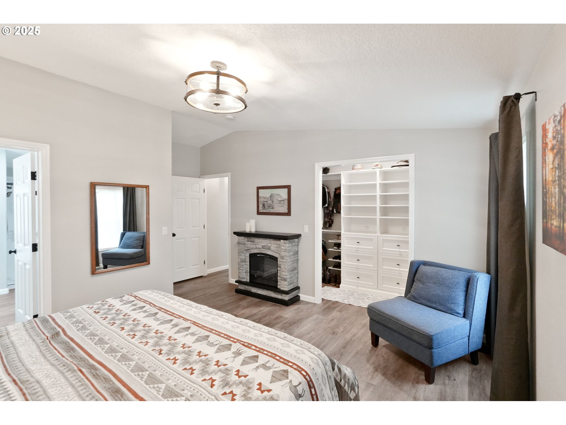 40219 North Dogwood Road Mill City, OR 97360 - Photo 20 of 47 a bedroom with a bed and a couch