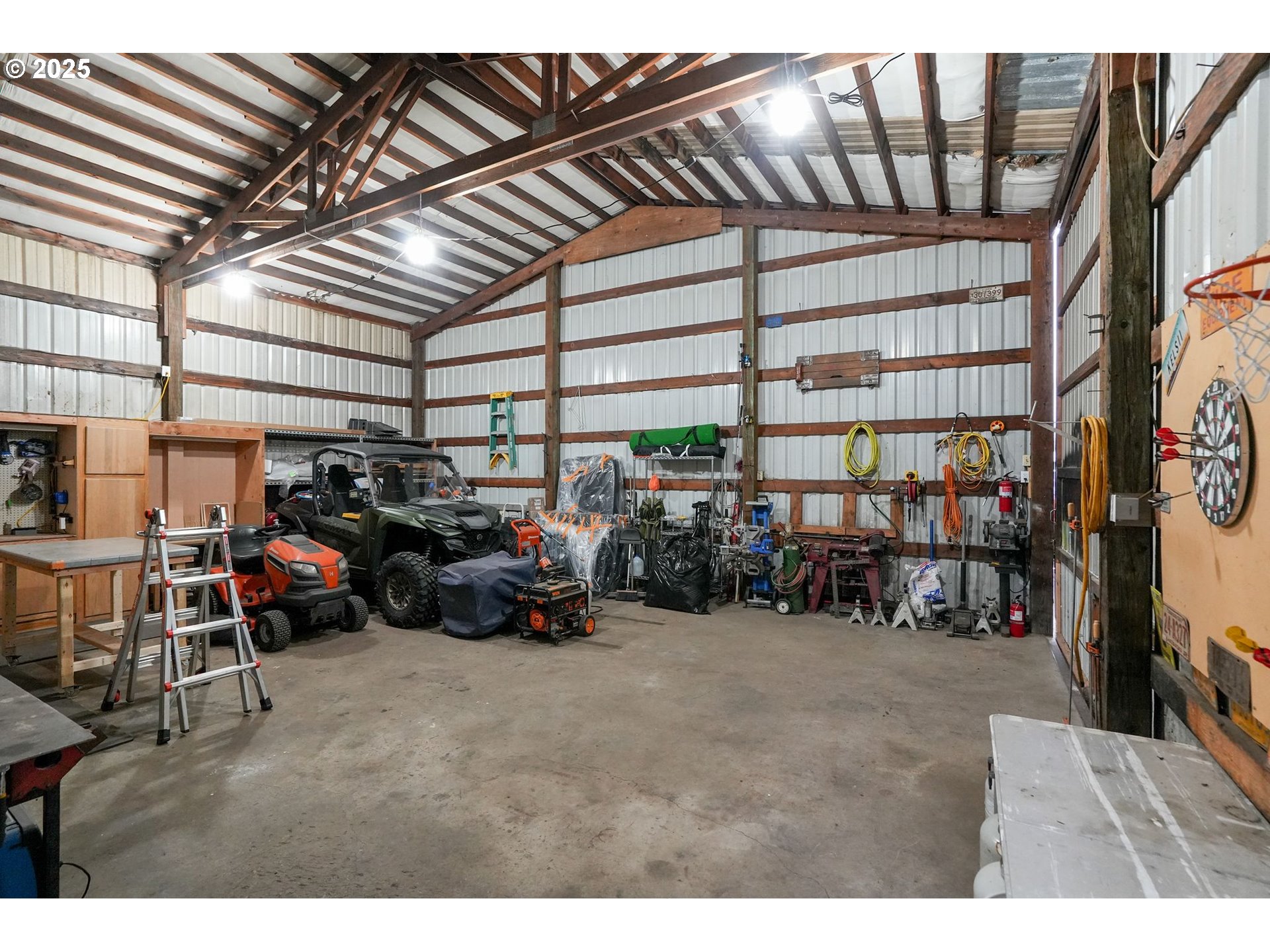 40219 North Dogwood Road Mill City, OR 97360 - Photo 36 of 47 a view of a garage with a lot of stuff
