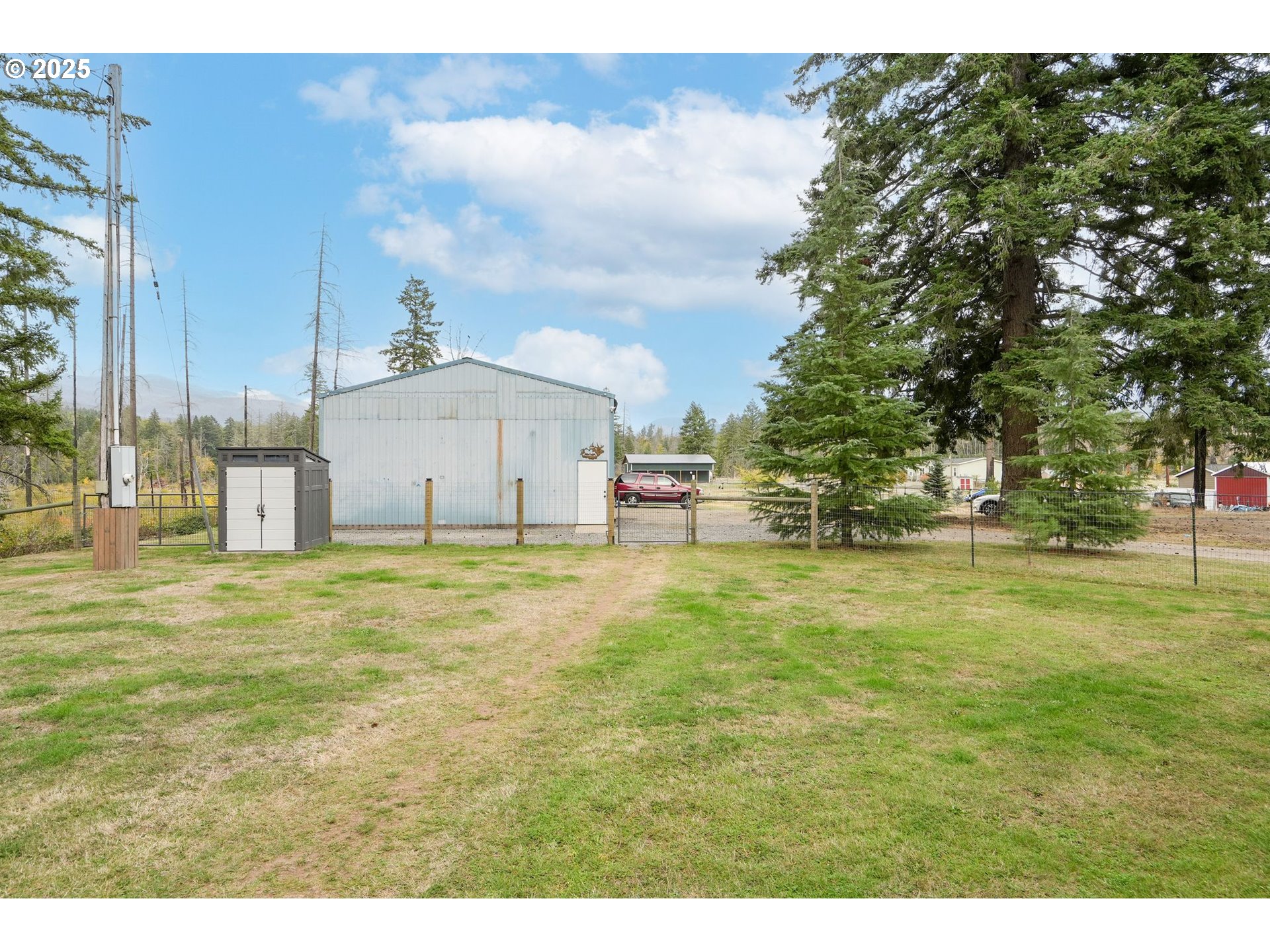 40219 North Dogwood Road Mill City, OR 97360 - Photo 39 of 47 a house view with swimming pool in front of it
