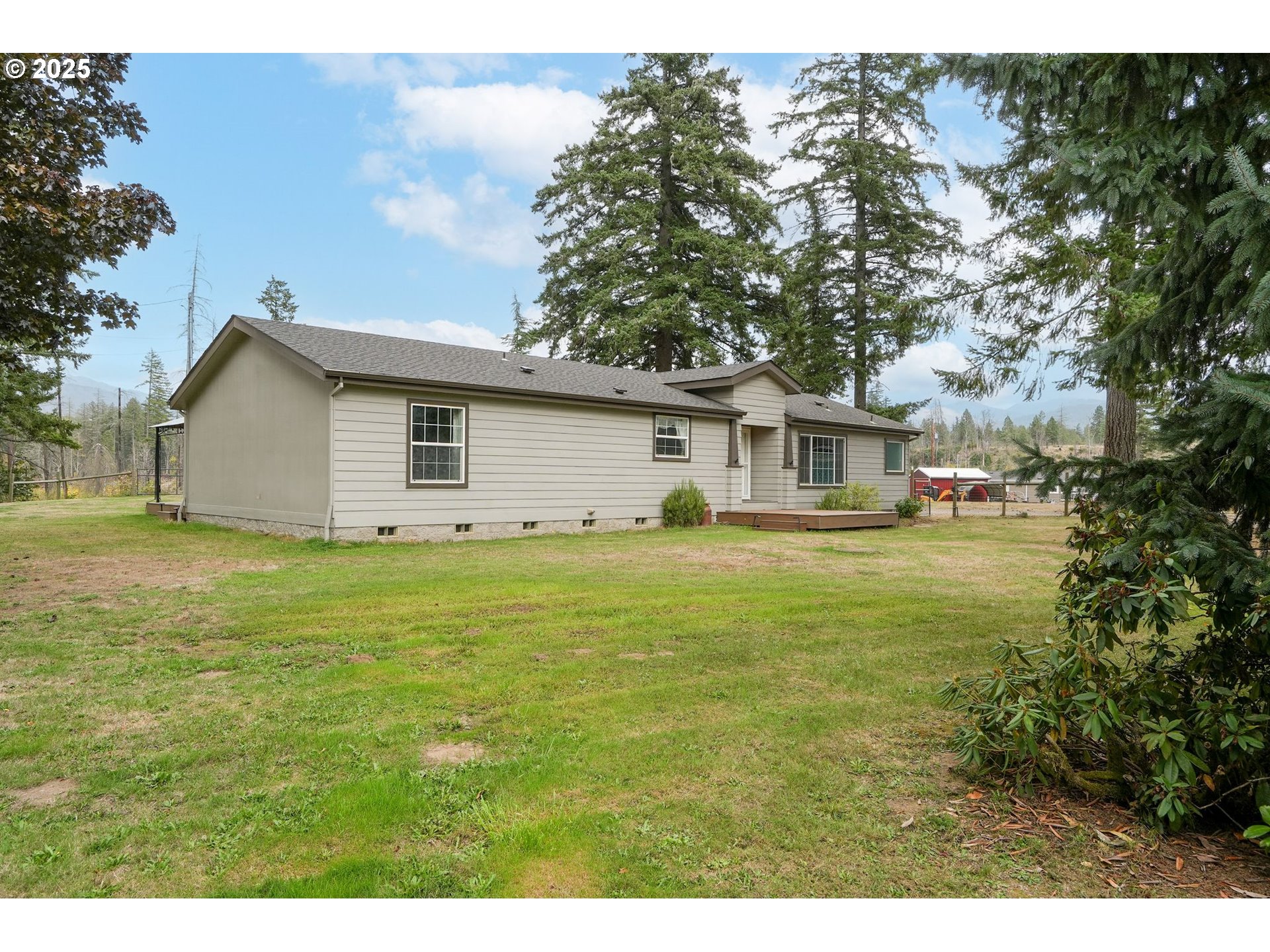 40219 North Dogwood Road Mill City, OR 97360 - Photo 44 of 47 a house view with a outdoor space
