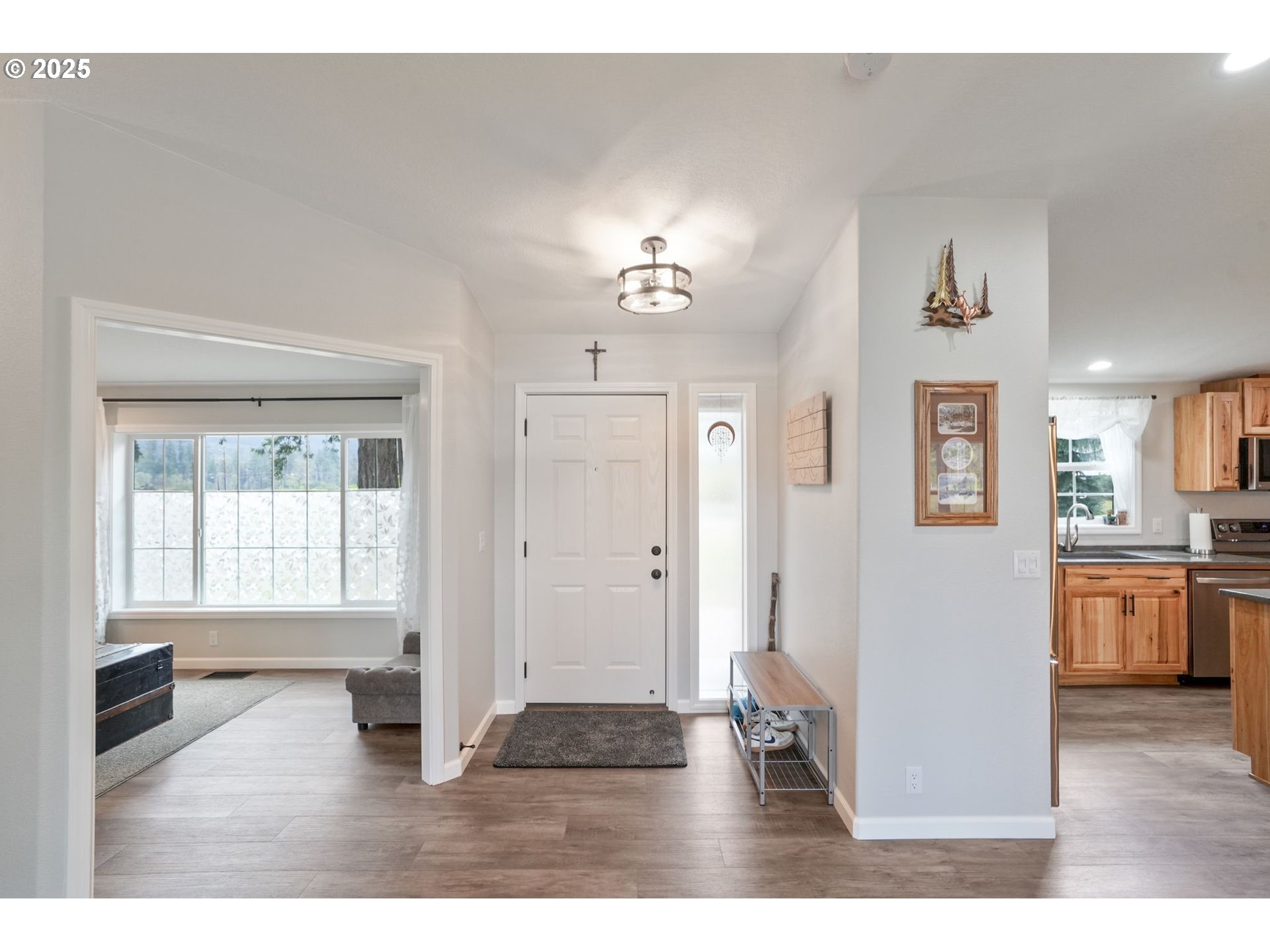 40219 North Dogwood Road Mill City, OR 97360 - Photo 5 of 47 a living room with furniture and a kitchen