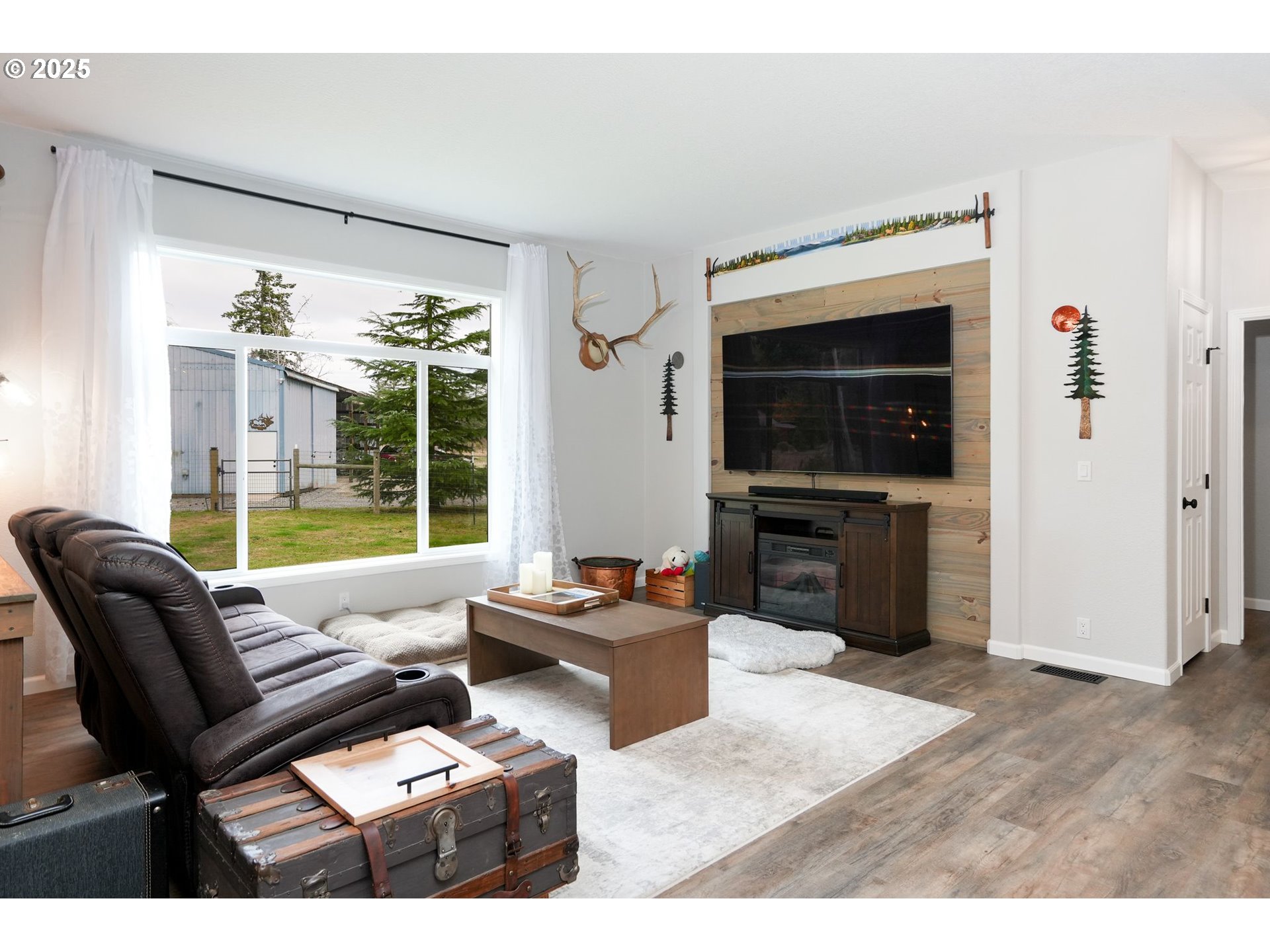 40219 North Dogwood Road Mill City, OR 97360 - Photo 7 of 47 a living room with furniture and a flat screen tv
