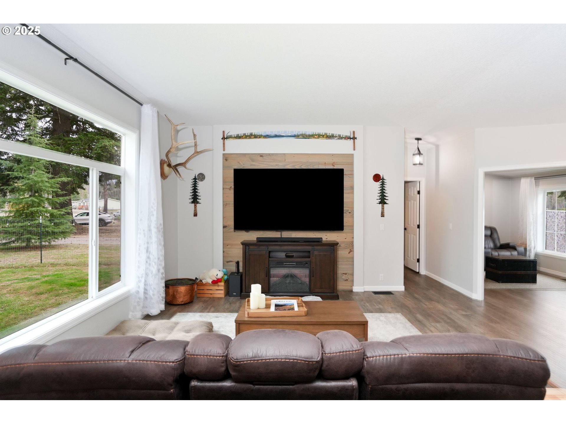 40219 North Dogwood Road Mill City, OR 97360 - Photo 8 of 47 a living room with furniture and a flat screen tv