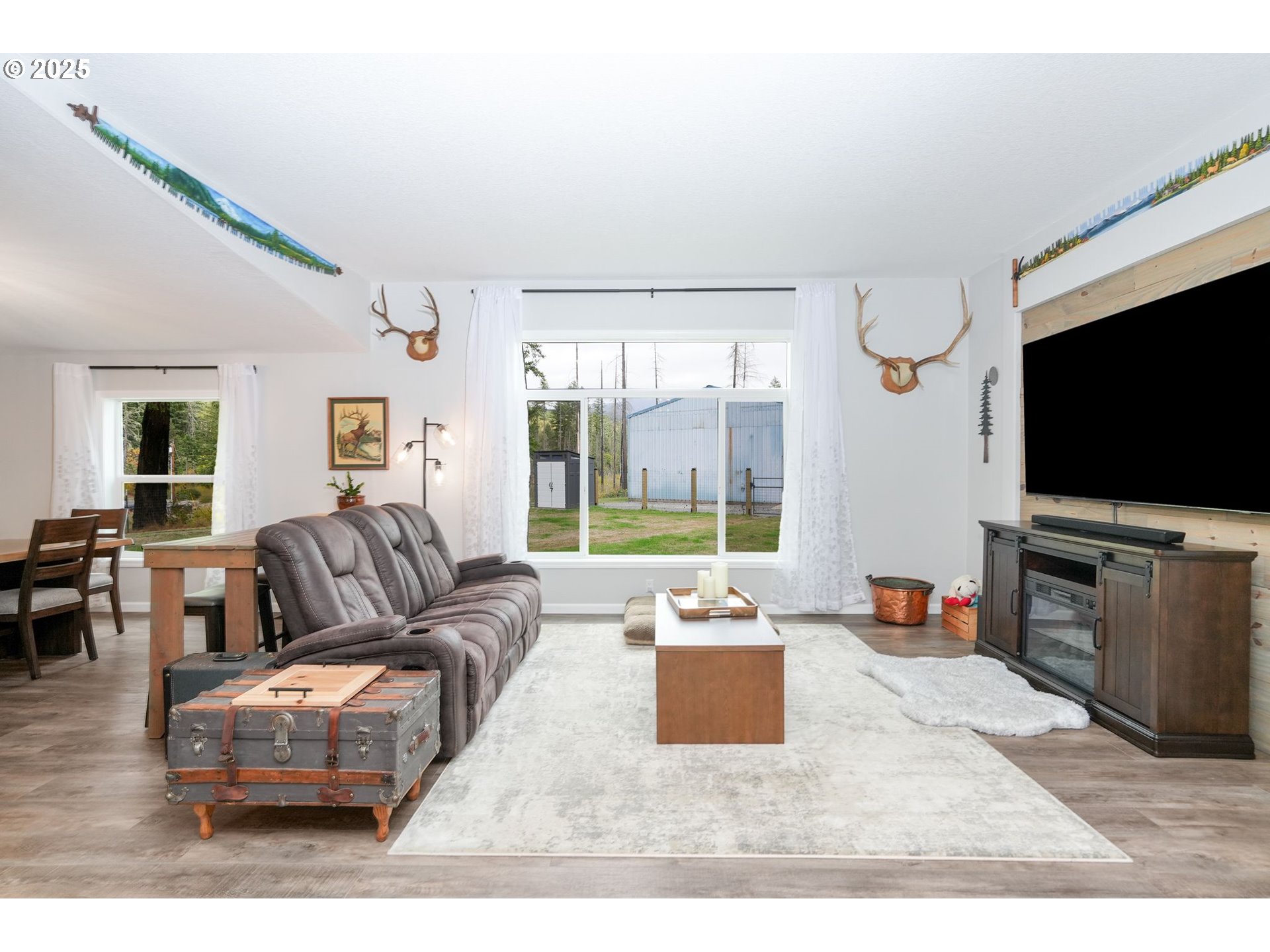 40219 North Dogwood Road Mill City, OR 97360 - Photo 10 of 47 a living room with furniture and a flat screen tv