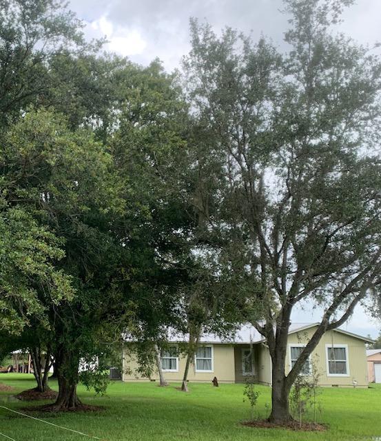 18461 138th Way North Jupiter, FL 33478 - Photo 1 of 5 House front facade