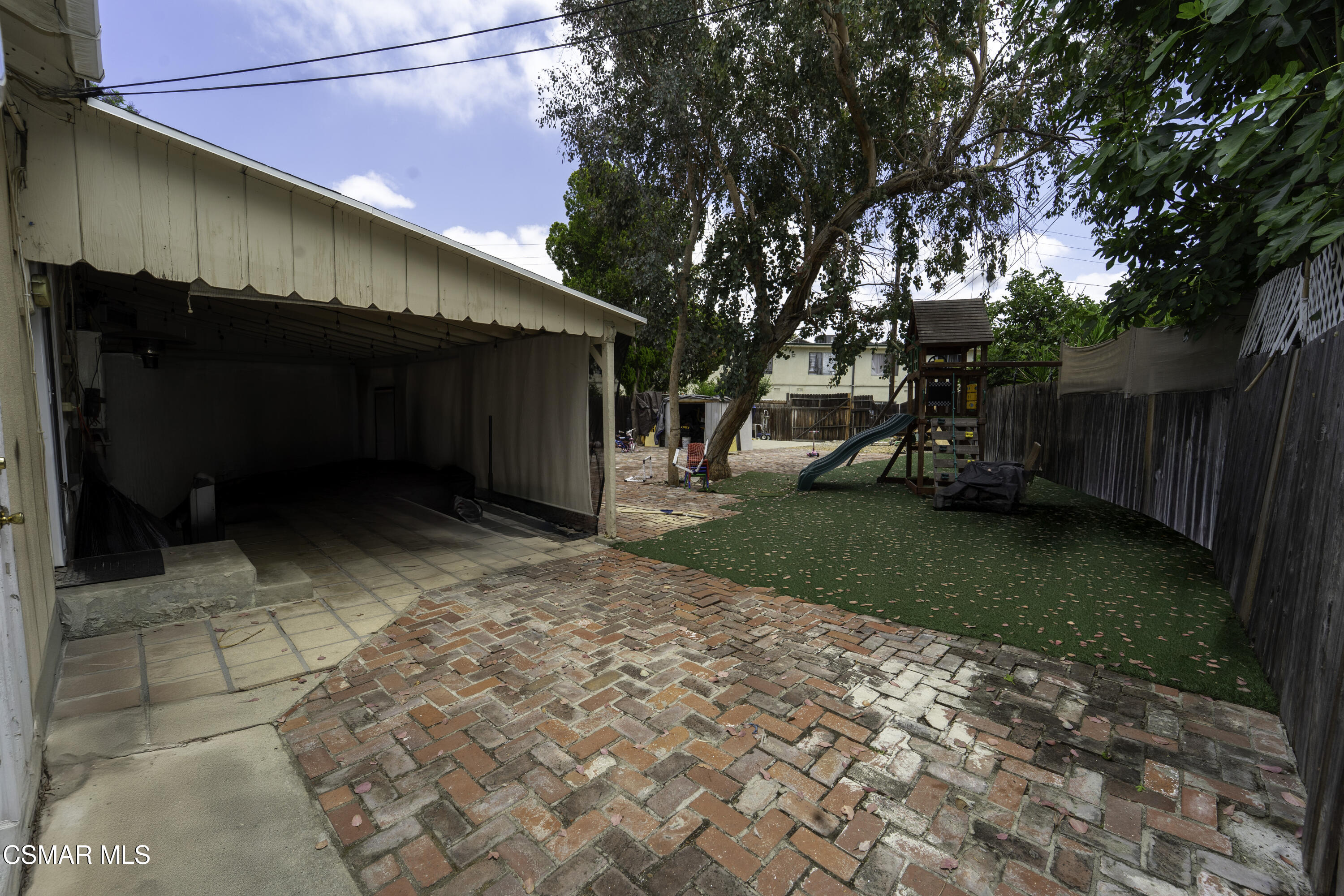 5834 Balcom Avenue Encino, CA 91316 - Photo 6 of 10 a view of a house with a yard