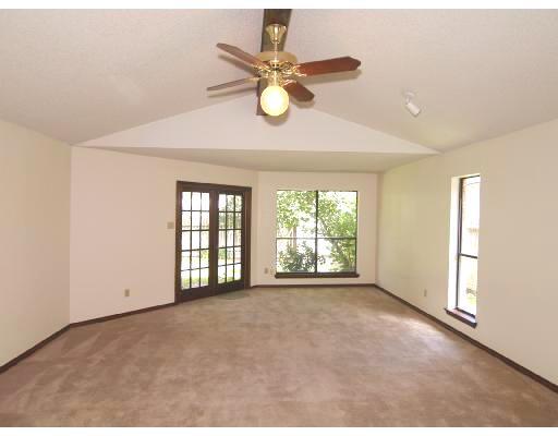 7238 Pepper Ridge Road Corpus Christi, TX 78413 - Photo 5 of 7 a view of an empty room with a window