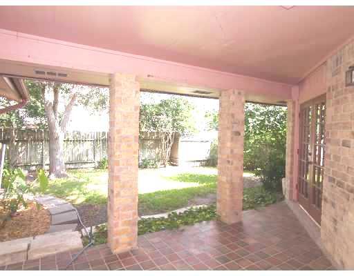 7238 Pepper Ridge Road Corpus Christi, TX 78413 - Photo 7 of 7 a front view of a house with garden
