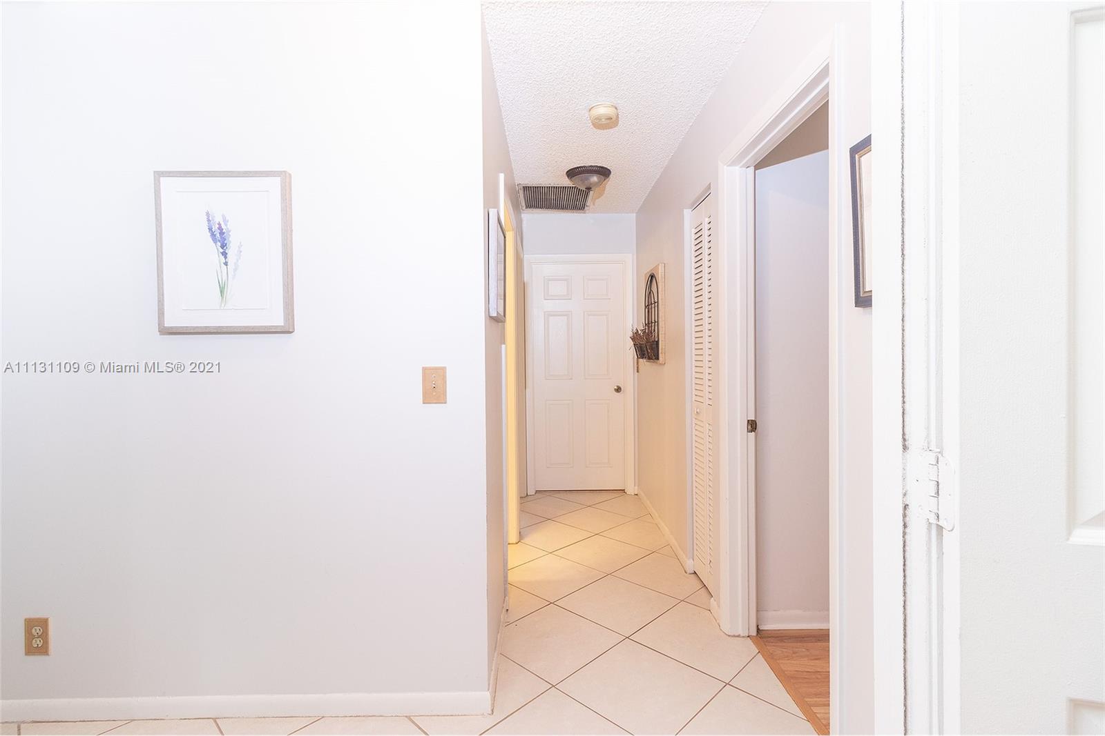 9248 Neptunes Basin Court Boca Raton, FL 33434 - Photo 27 of 34 a bathroom with a shower and a glass door
