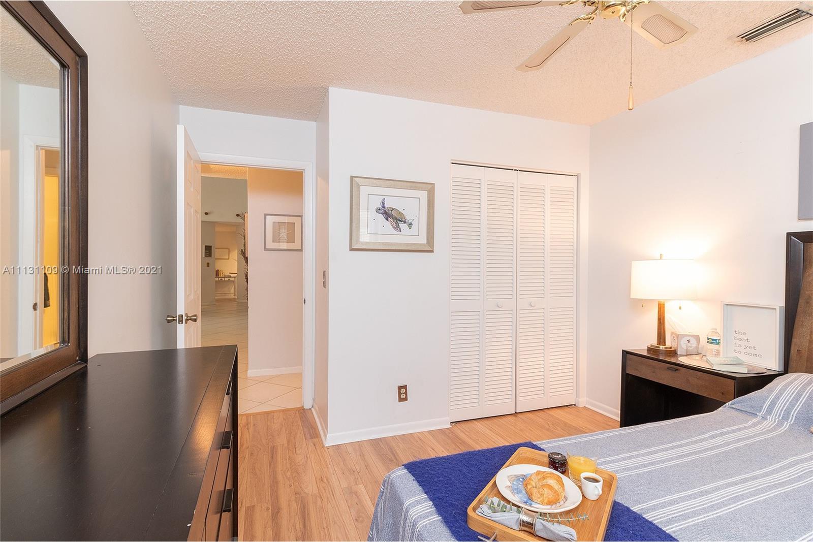 9248 Neptunes Basin Court Boca Raton, FL 33434 - Photo 29 of 34 a view of a living room and dining room