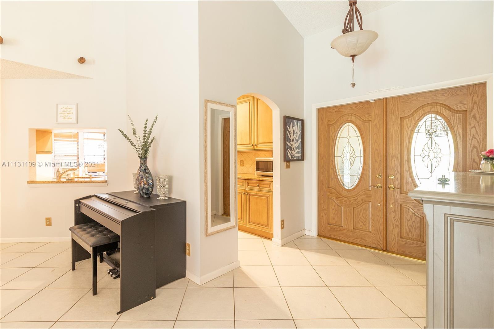 9248 Neptunes Basin Court Boca Raton, FL 33434 - Photo 6 of 34 a view of a kitchen with a window