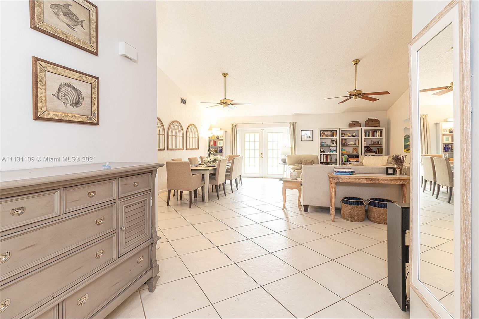 9248 Neptunes Basin Court Boca Raton, FL 33434 - Photo 7 of 34 a kitchen with granite countertop cabinets and chair