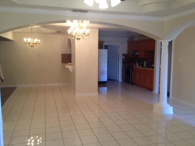 116 Broadcrest Drive Laredo, TX 78045 - Photo 3 of 6 a view of a kitchen with a refrigerator in a kitchen
