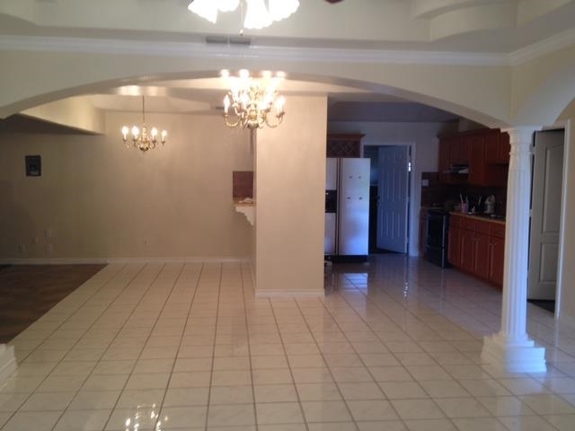 116 Broadcrest Drive Laredo, TX 78045 - Photo 5 of 6 a view of a livingroom with a chandelier