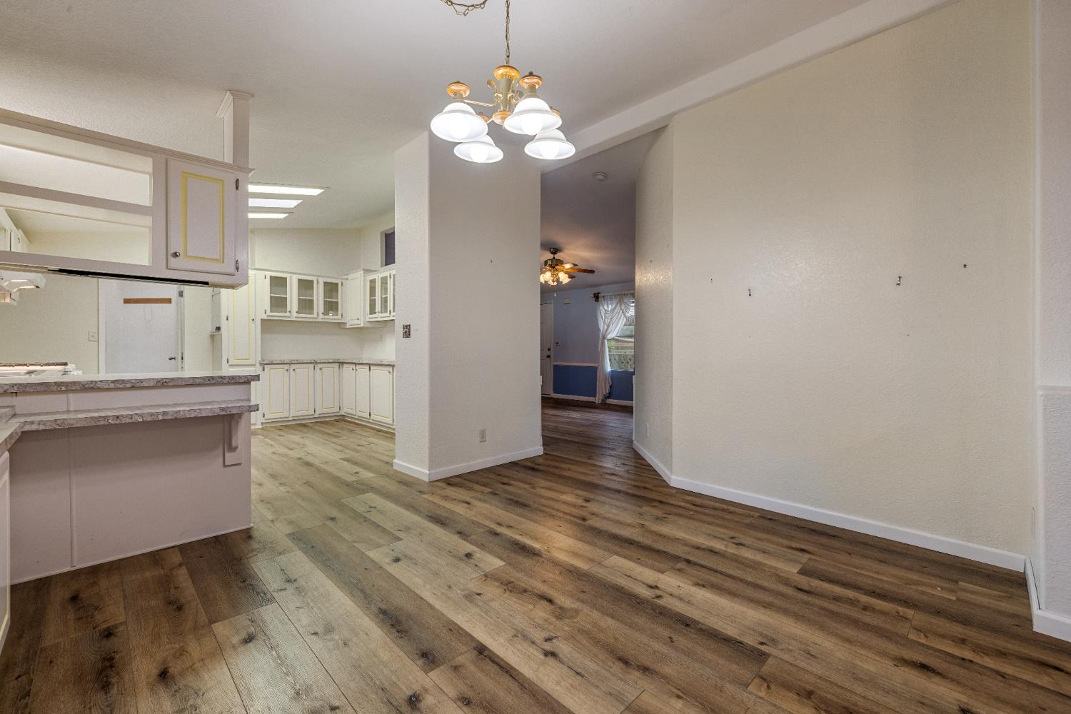 2621 Prescott Road, Unit 87 Modesto, CA 95350 - Photo 11 of 31 a view of a kitchen from the hallway
