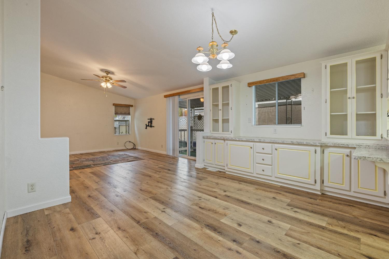 2621 Prescott Road, Unit 87 Modesto, CA 95350 - Photo 18 of 31 a view of an empty room with a kitchen