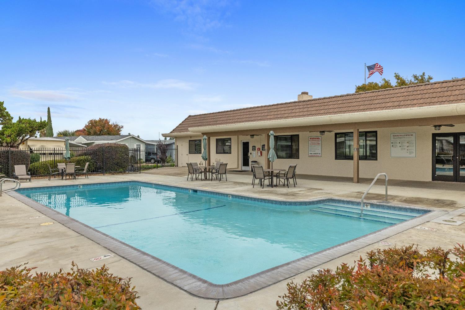 2621 Prescott Road, Unit 87 Modesto, CA 95350 - Photo 29 of 31 a view of a house with swimming pool and sitting area