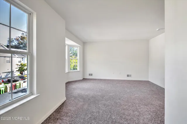 a bathroom with a toilet a sink and bathtub