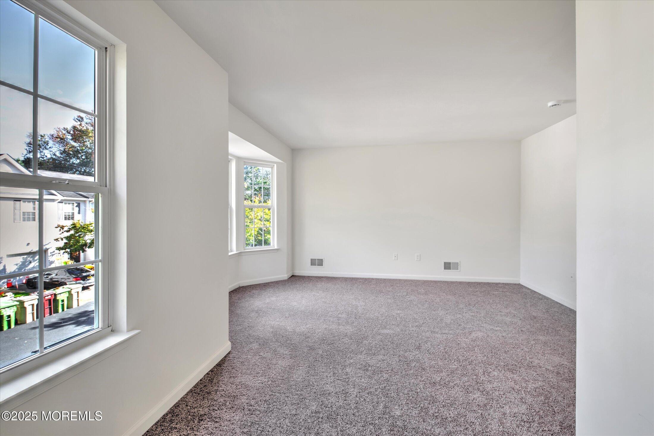 1 Esplanade Way Bayville, NJ 08721 - Photo 26 of 41 an empty room with windows