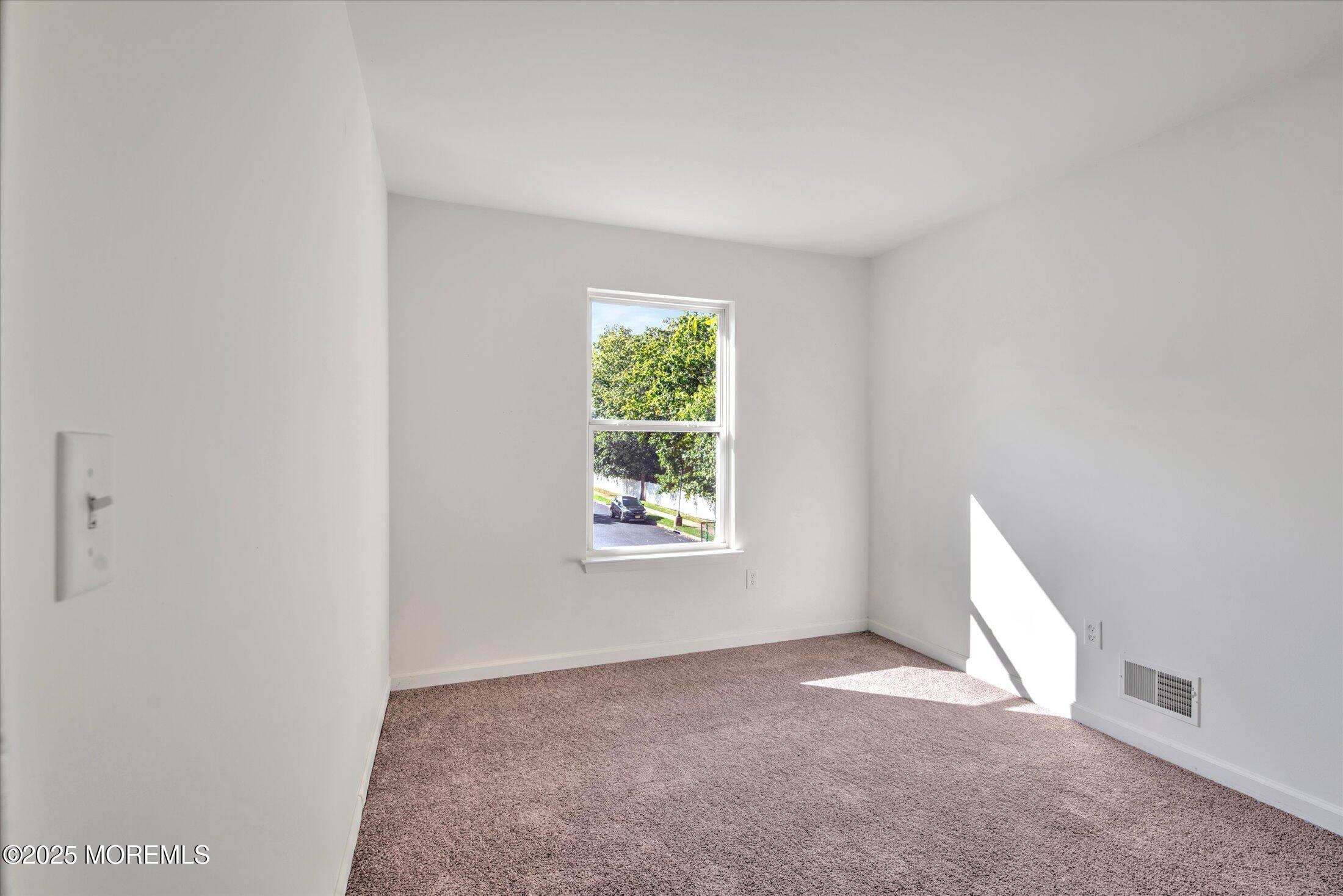 1 Esplanade Way Bayville, NJ 08721 - Photo 29 of 41 an empty room with windows