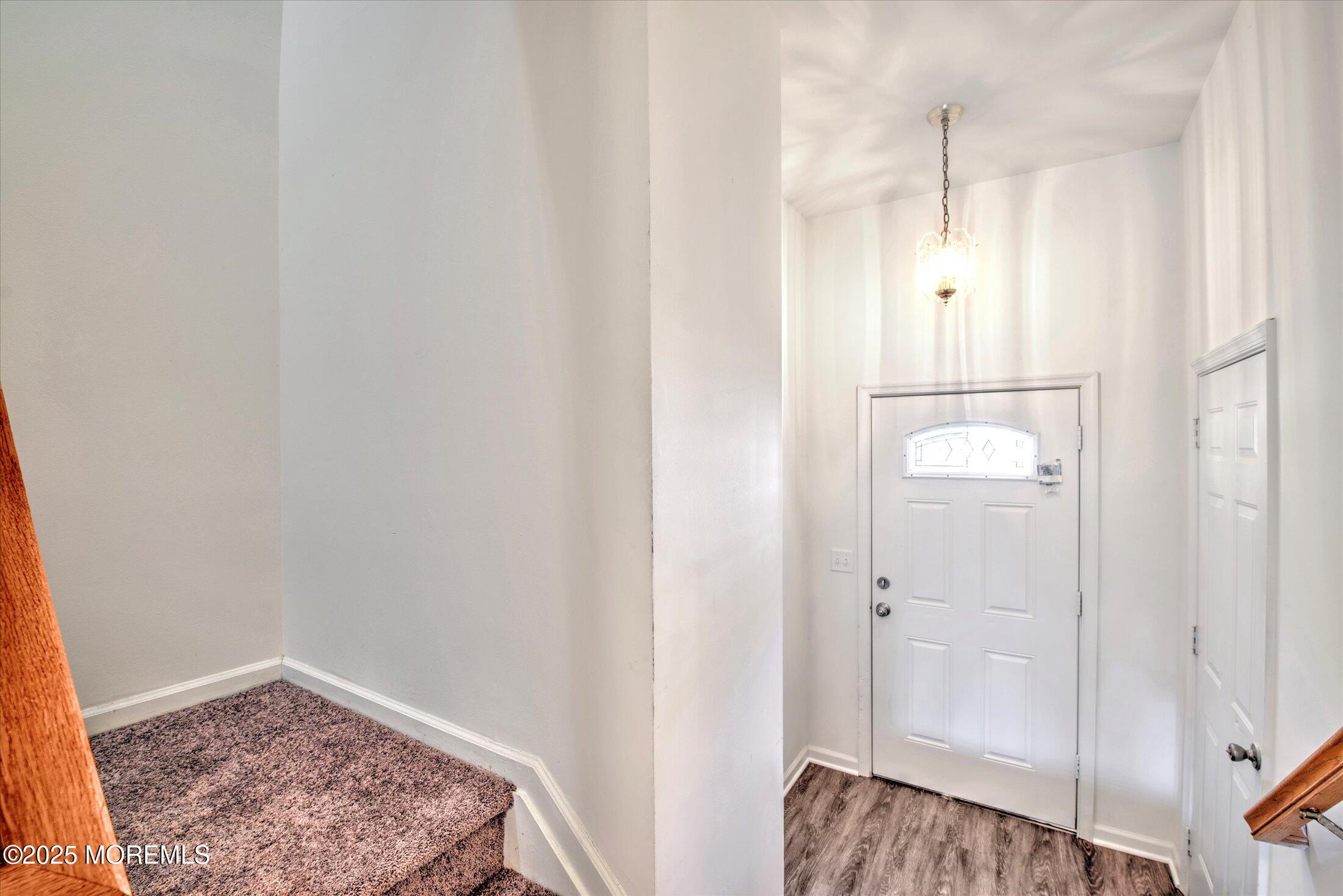 1 Esplanade Way Bayville, NJ 08721 - Photo 3 of 41 a view of hallway with closet and wooden floor